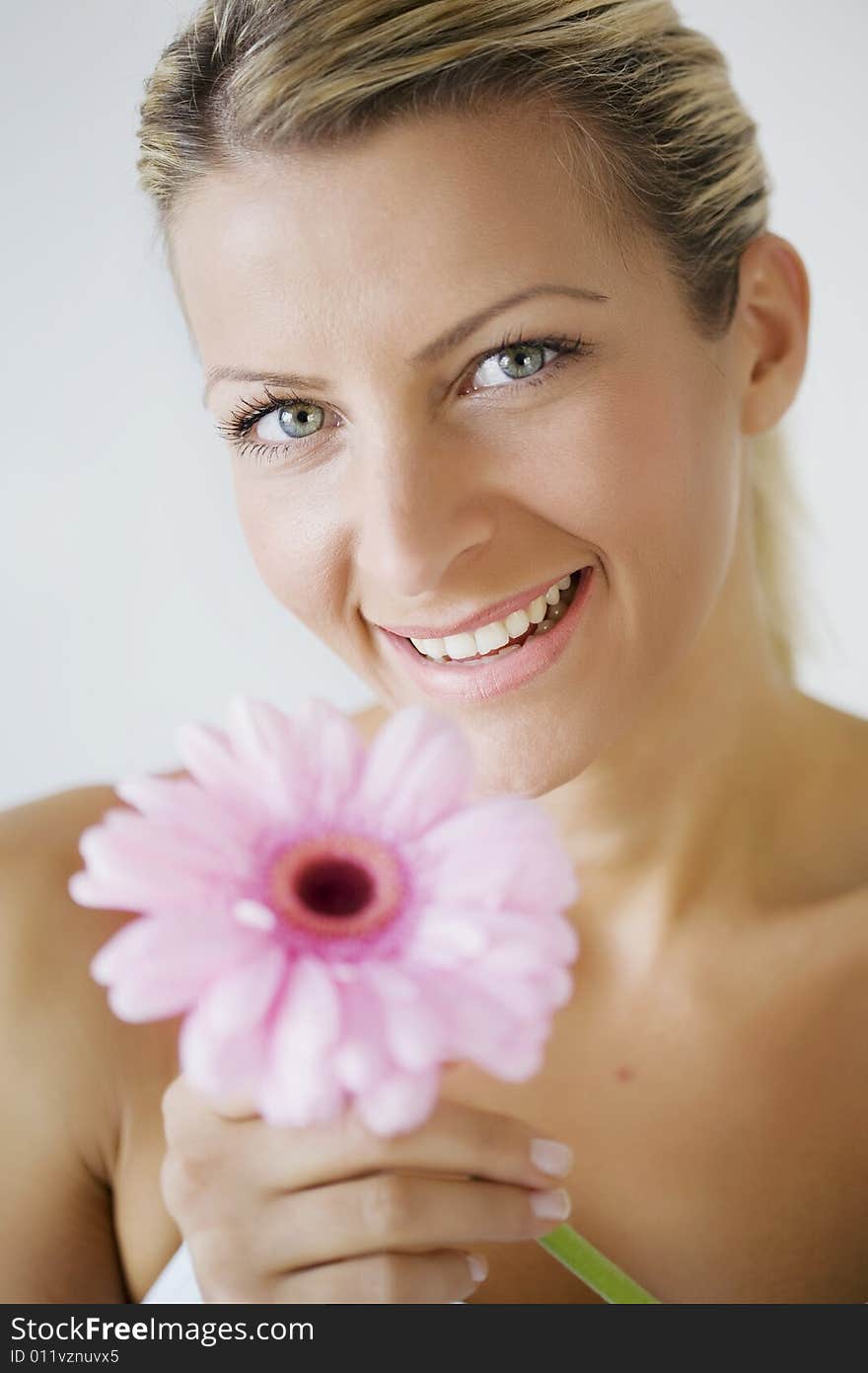 Portrait of young woman with flower. Portrait of young woman with flower