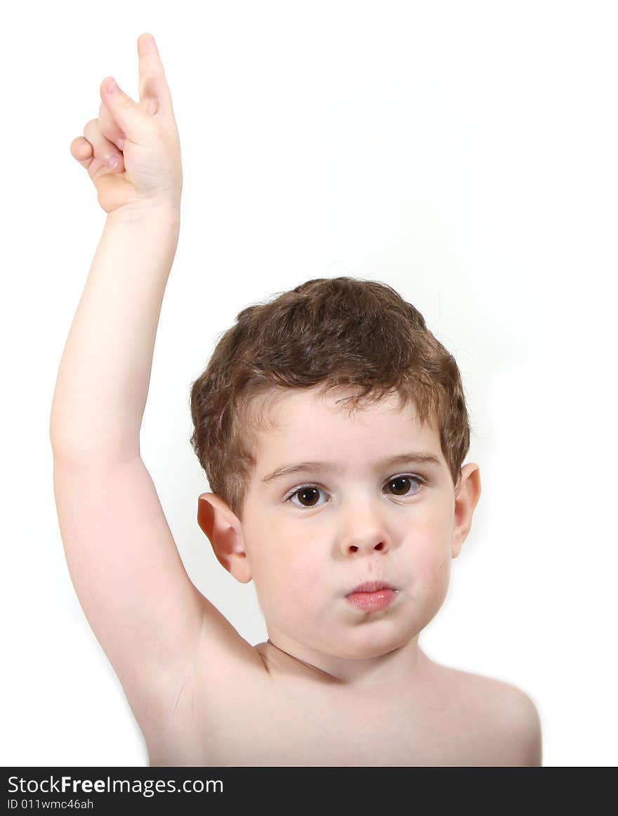 3 year old boy pointing up with his finger