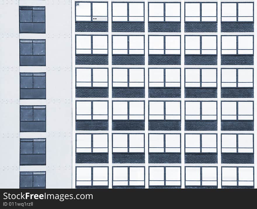 Detailed view of windows in apartment building. Detailed view of windows in apartment building