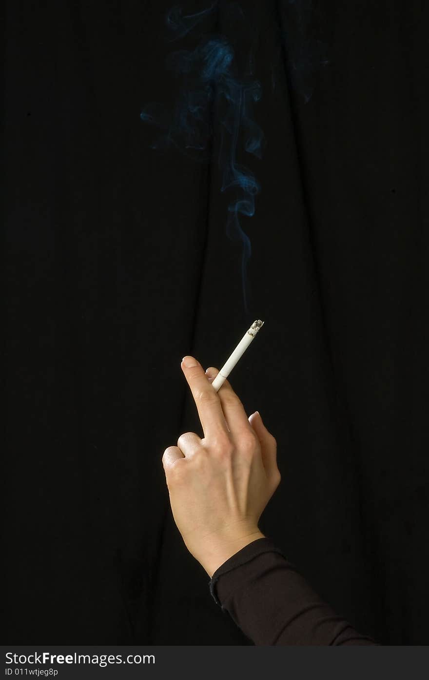 Woman s hand with cigarette 3