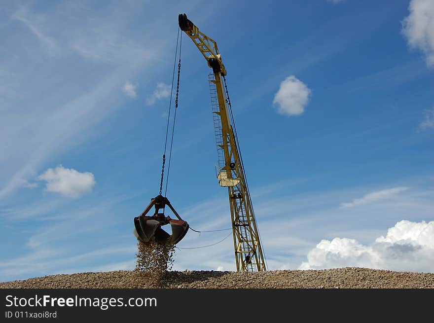 The port dredge unloads gravel