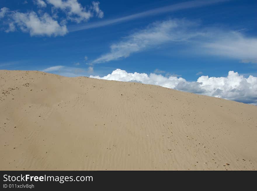 Sand hill and blue sky