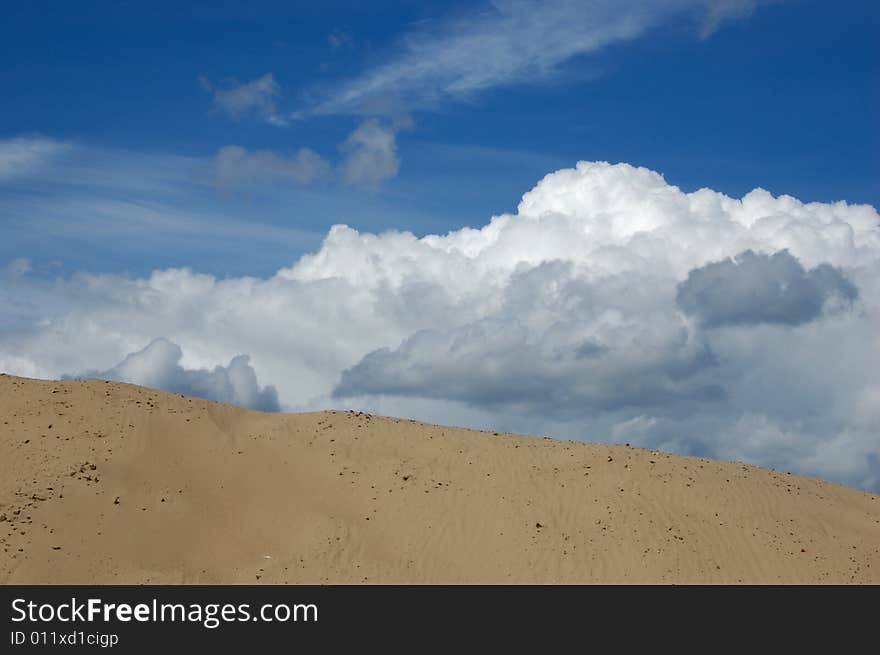 Sand hill and blue sky