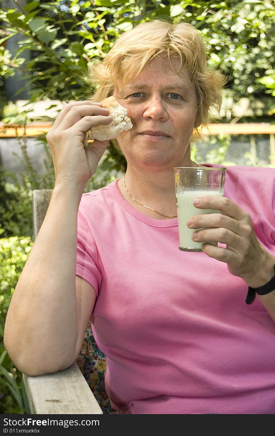 Elderly Woman Is Having Lunch