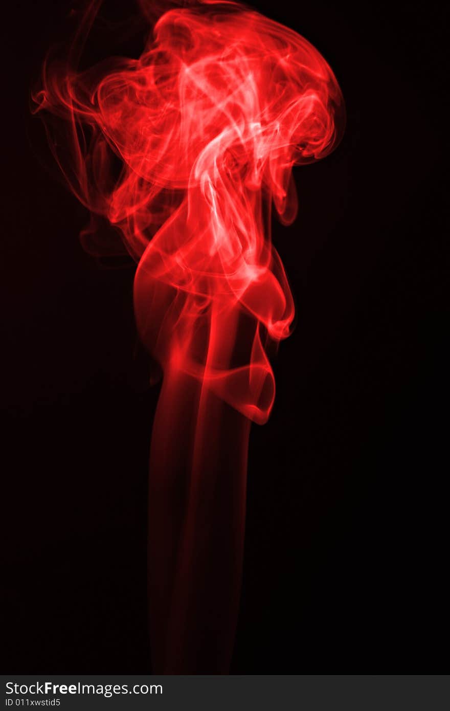 Red flame smoke on black background