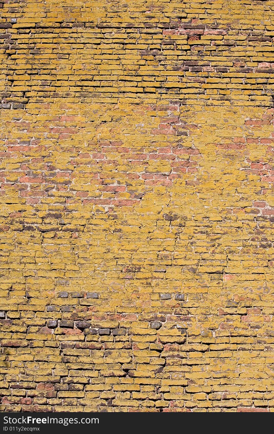 Structure of old mossy wall in Prague. Background texture.