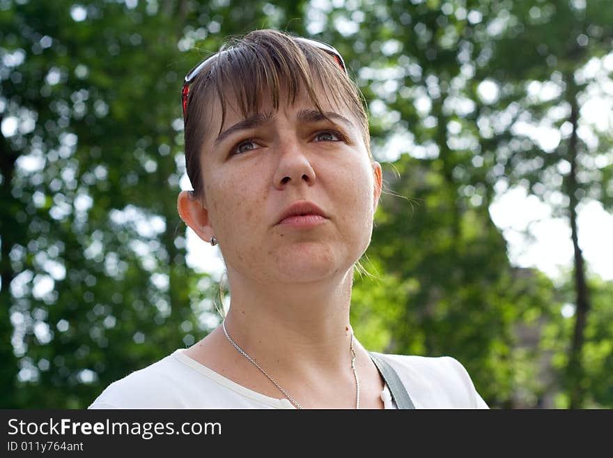 The thoughtful adult  woman portrait, colourful photo