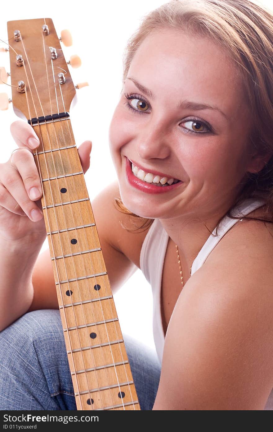 Beautiful girl posing with guitar. 2