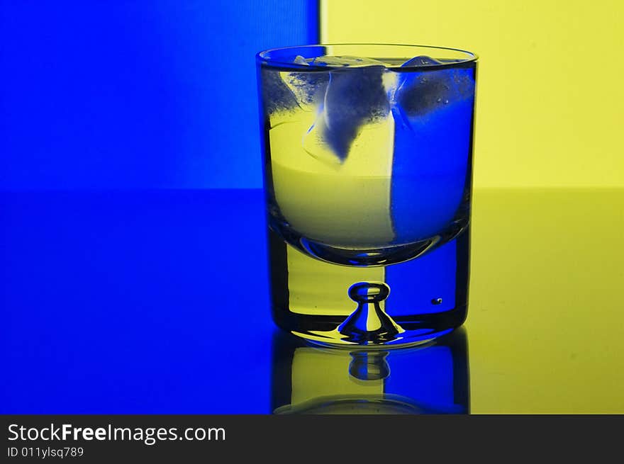 Glass with ice with background