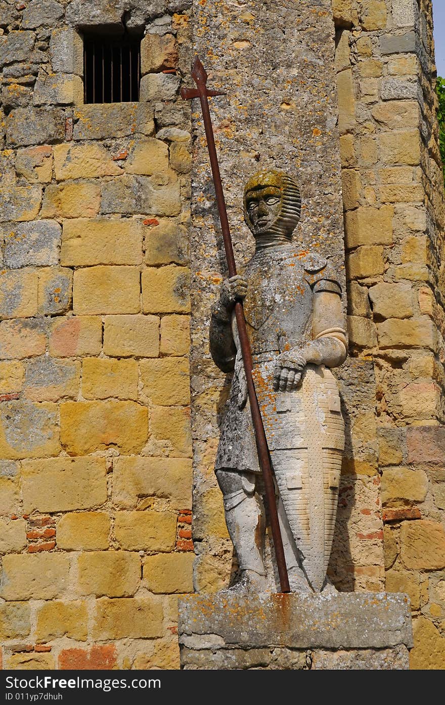 The statue of stone in village of Avignonet