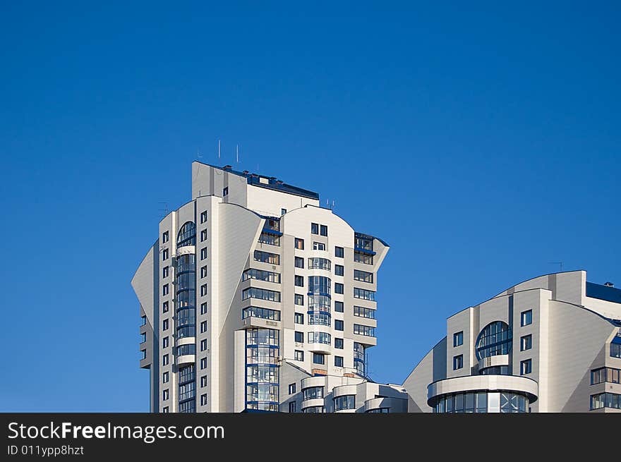 New modern housing estate (multistory complex), clear blue sky. New modern housing estate (multistory complex), clear blue sky