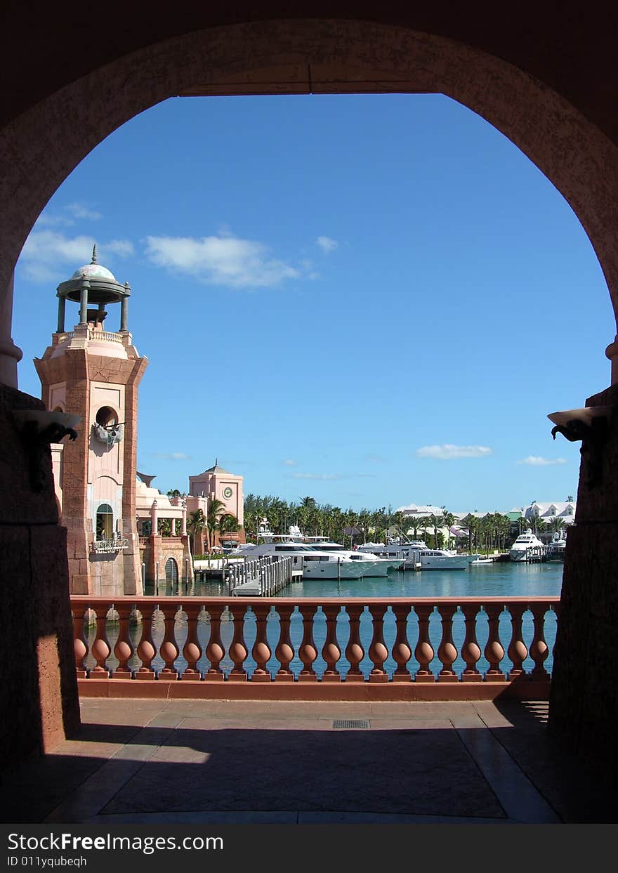 The framed view of Paradise Island harbour and the resort building (The Bahamas). The framed view of Paradise Island harbour and the resort building (The Bahamas).