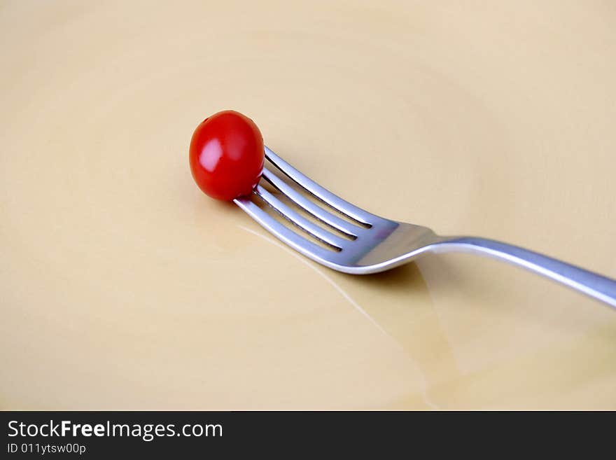 Single Tomato On Fork