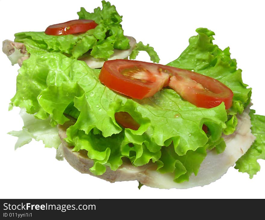 Hamburger composed of salad, bacon and tomatos isolated on a white background. Hamburger composed of salad, bacon and tomatos isolated on a white background