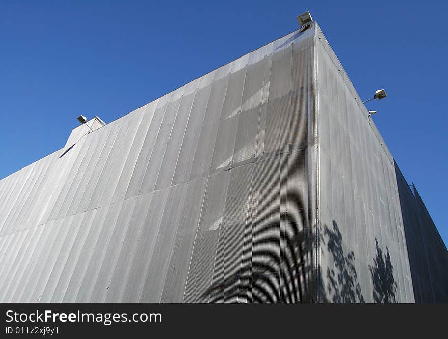 Modern car parking building and blue sky. Modern car parking building and blue sky