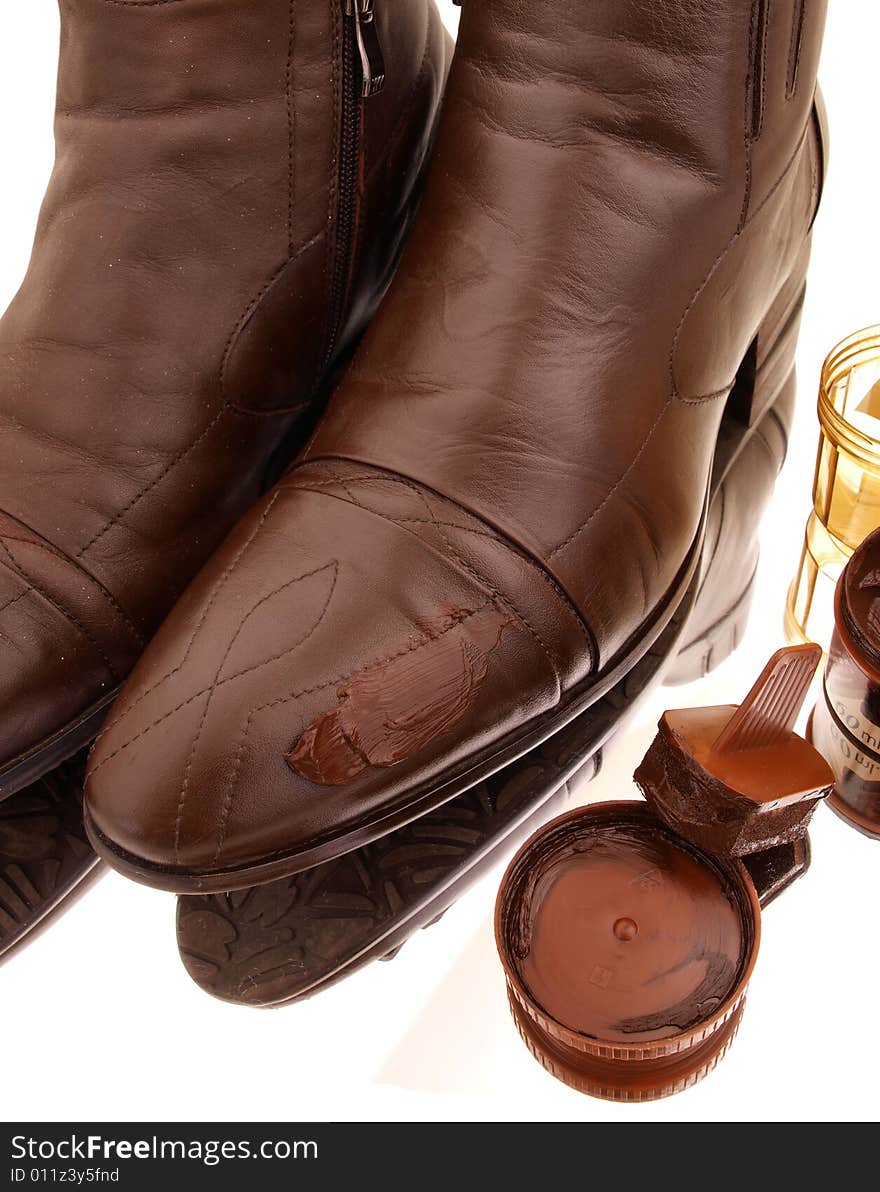 A pair of Brown boots polished to shine