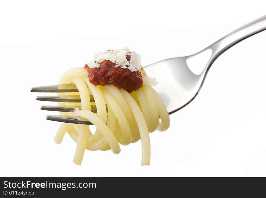 Spaghetti on a fork over white background