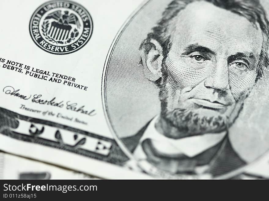 Closeup of lincoln on five dollar bill. Closeup of lincoln on five dollar bill