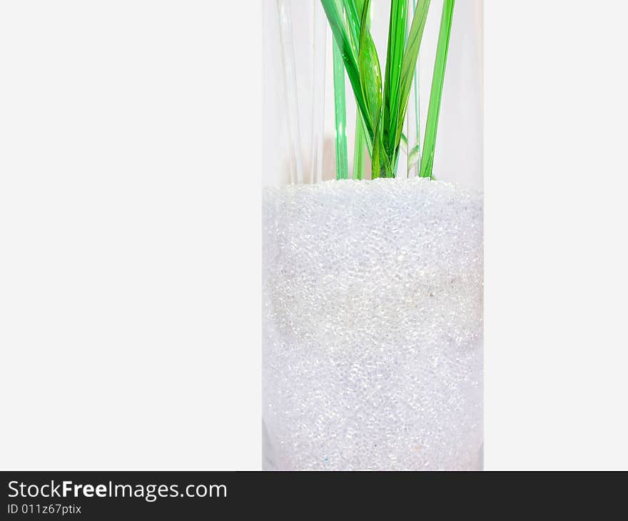 Glass,bits, clear, vase, green,crystal,stems,shiny,reflective, decorative,ornamental, white. Glass,bits, clear, vase, green,crystal,stems,shiny,reflective, decorative,ornamental, white