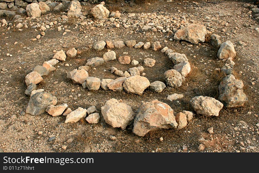 Stone curl on dry earth