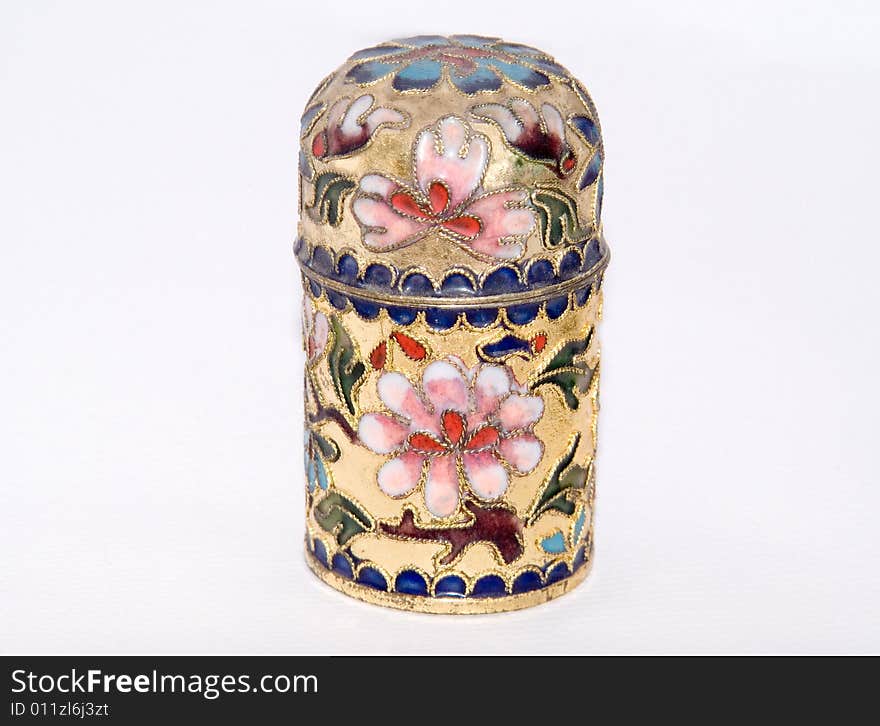 This is the colse-up of a toothpick pot. It is made in Chinese traditional cloisonne technical. This is the colse-up of a toothpick pot. It is made in Chinese traditional cloisonne technical.