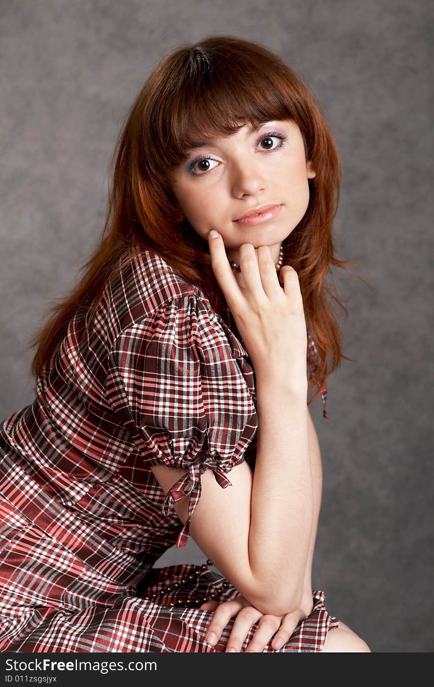 Fashion girl on a Grey background