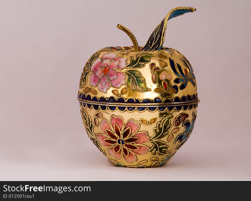 This is the colse-up of a small art pot. It is made in Chinese traditional cloisonne technical. This is the colse-up of a small art pot. It is made in Chinese traditional cloisonne technical.