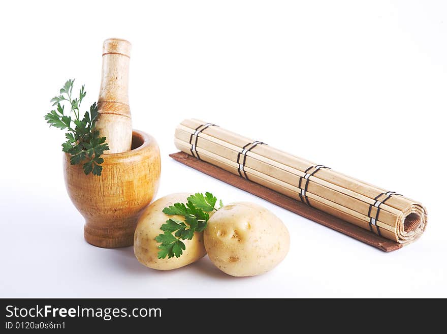 Mortar and pestle, kitchen scene shot in studio, isolated on white background. Mortar and pestle, kitchen scene shot in studio, isolated on white background