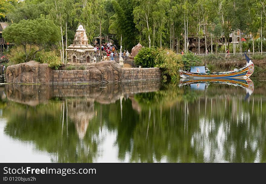 Reflections on a small lake from wooden structures. Reflections on a small lake from wooden structures.