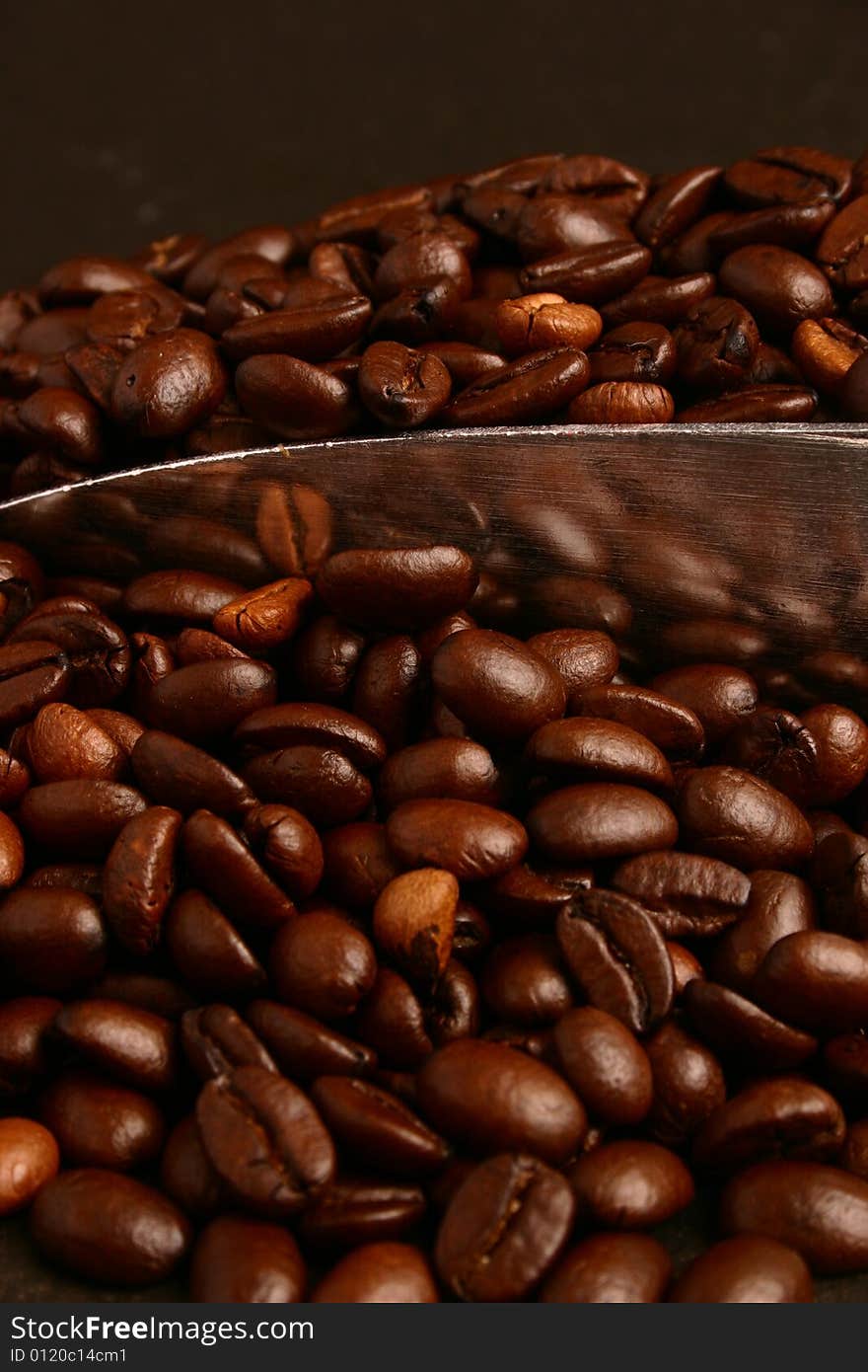 Coffee beans and scoop