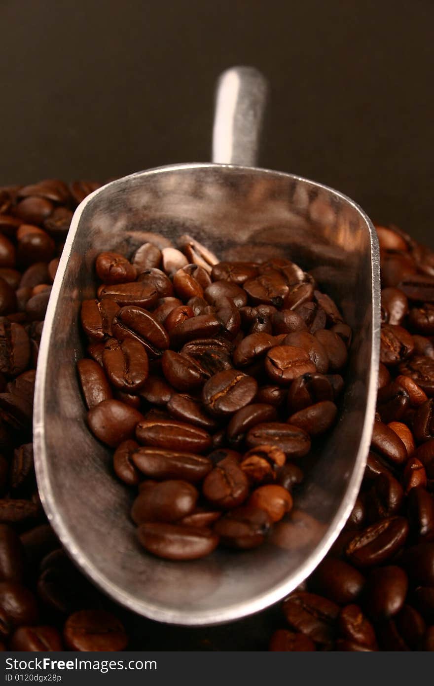 Coffee beans and scoop