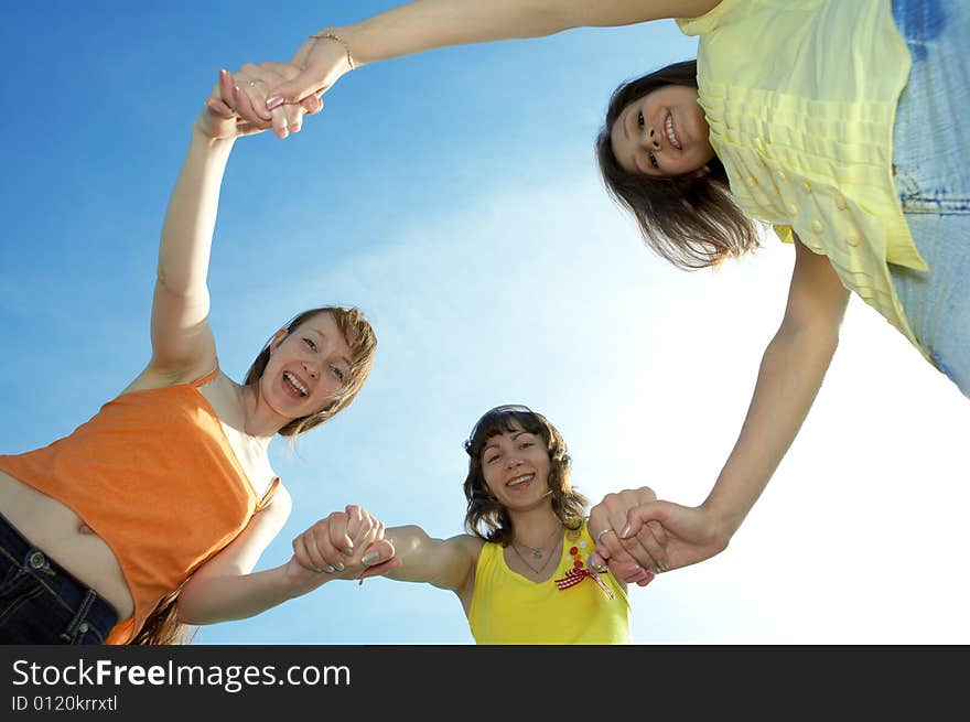 Three girl friend under blue sky