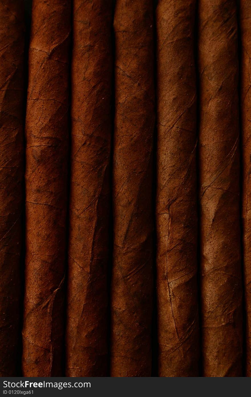 Pattern of cigars arranged next to each others