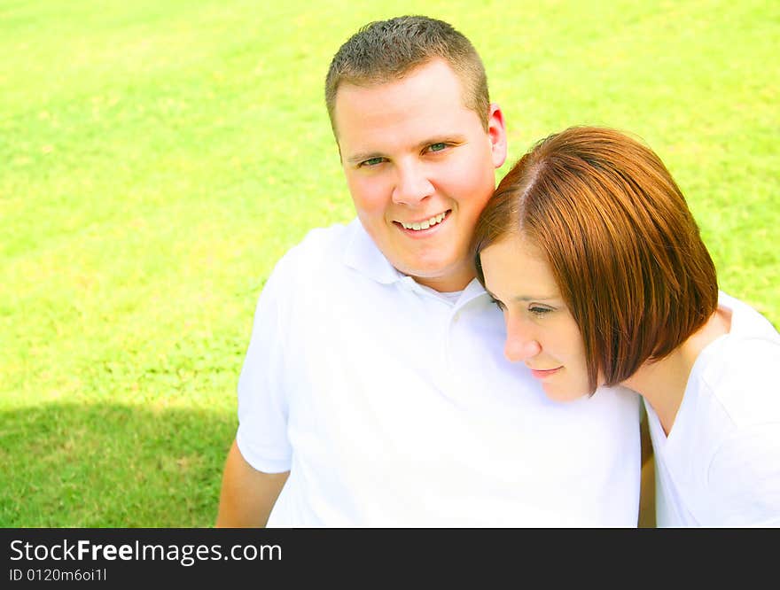 Lover Relaxing On Grass