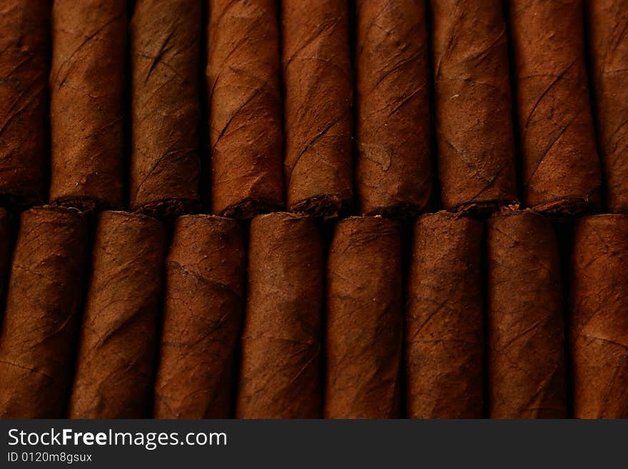 Pattern of cigars arranged next to each others