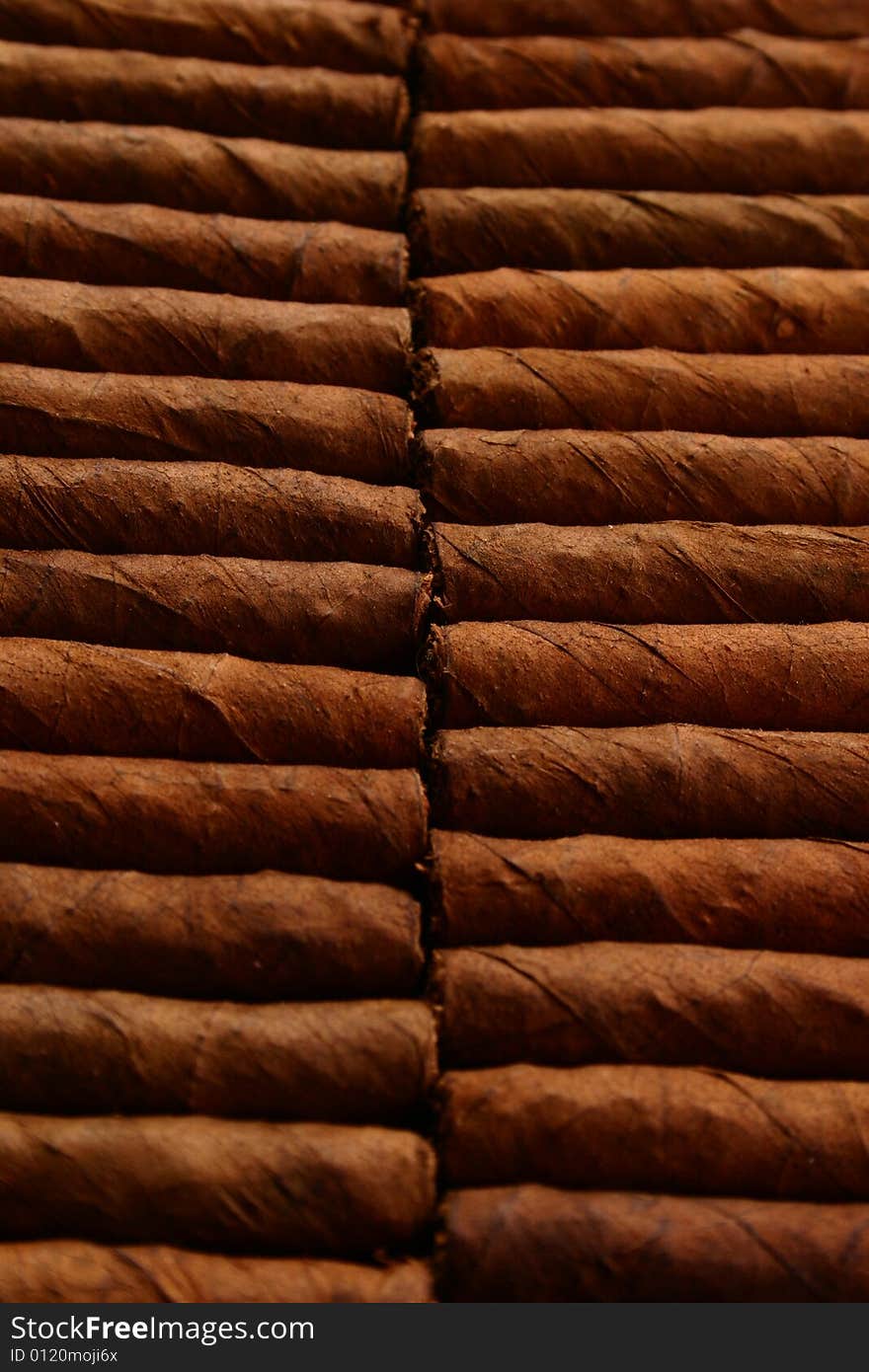 Pattern of cigars arranged next to each others