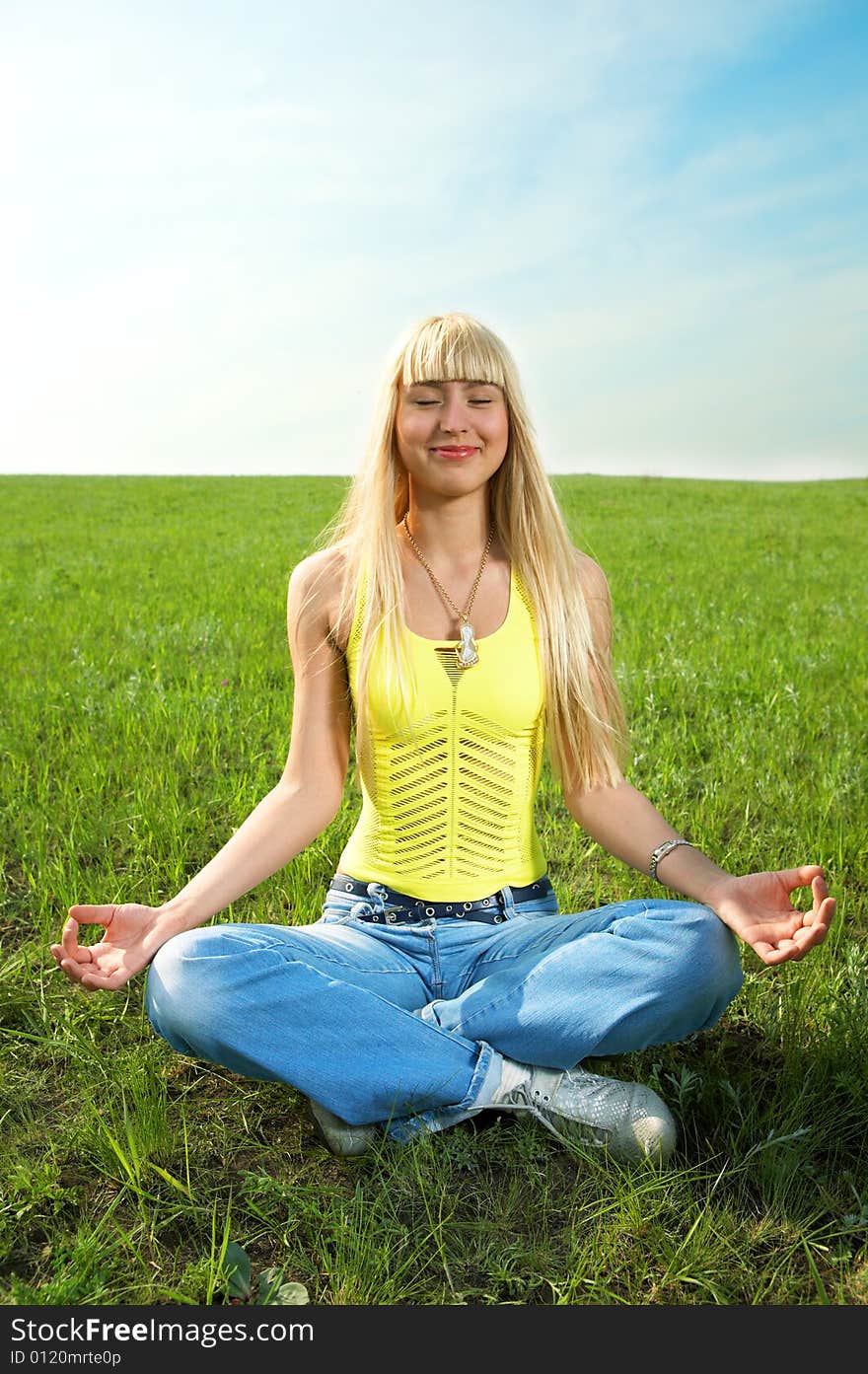 Woman in field hold hand palm up