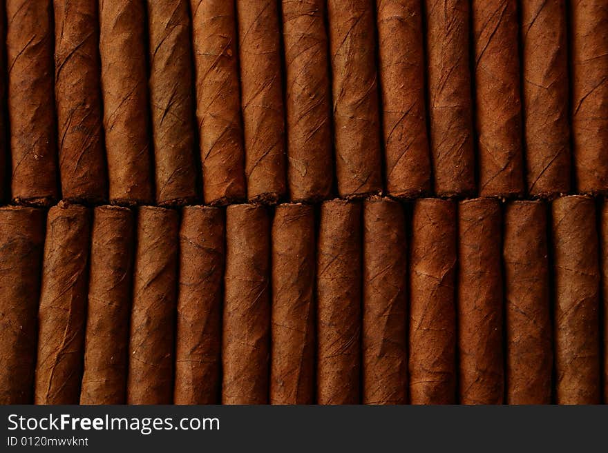 Pattern of cigars arranged next to each others