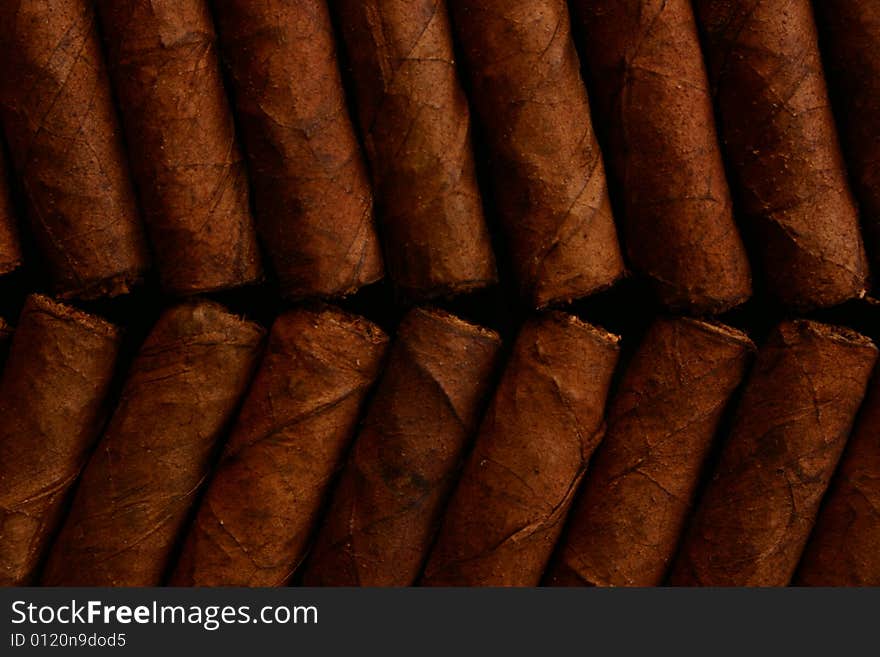 Pattern of cigars arranged next to each others