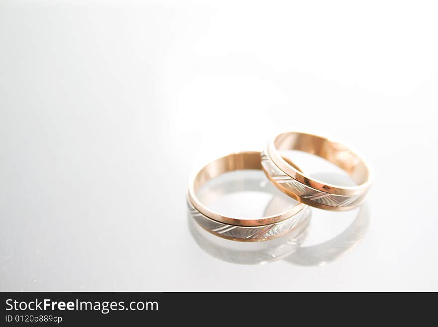 Two wedding rings - white and yellow gold. Two wedding rings - white and yellow gold