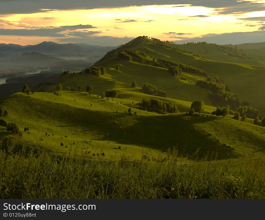 Sundown in misty mountain Altai. Sundown in misty mountain Altai