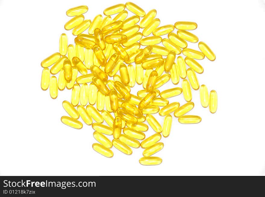 Yellow vitamins isolated on white