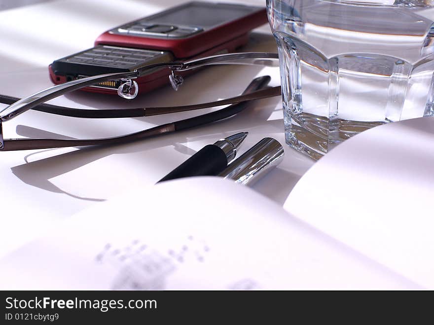 Glass of mineral water on the desk. Glass of mineral water on the desk