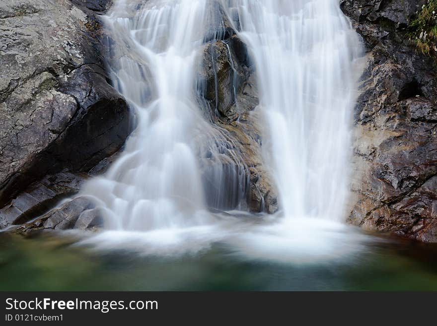 Double waterfall, summer season, horizontal frame; Italy. Double waterfall, summer season, horizontal frame; Italy