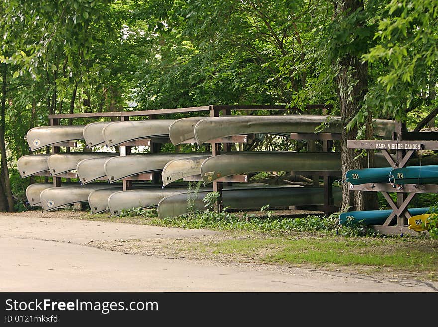 Bunch of canoes waiting to be rented. Bunch of canoes waiting to be rented