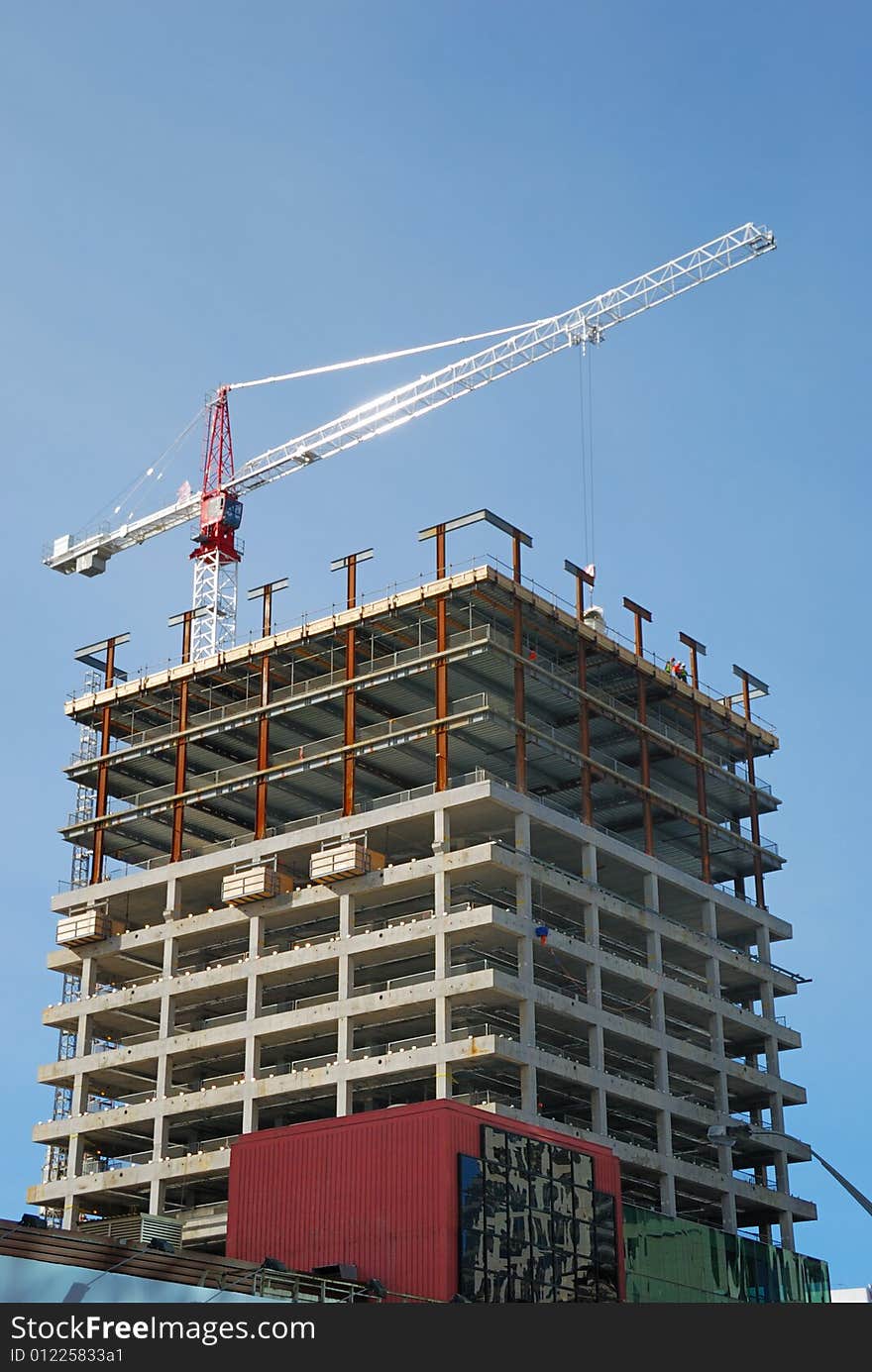 Construction crane with blue sky background