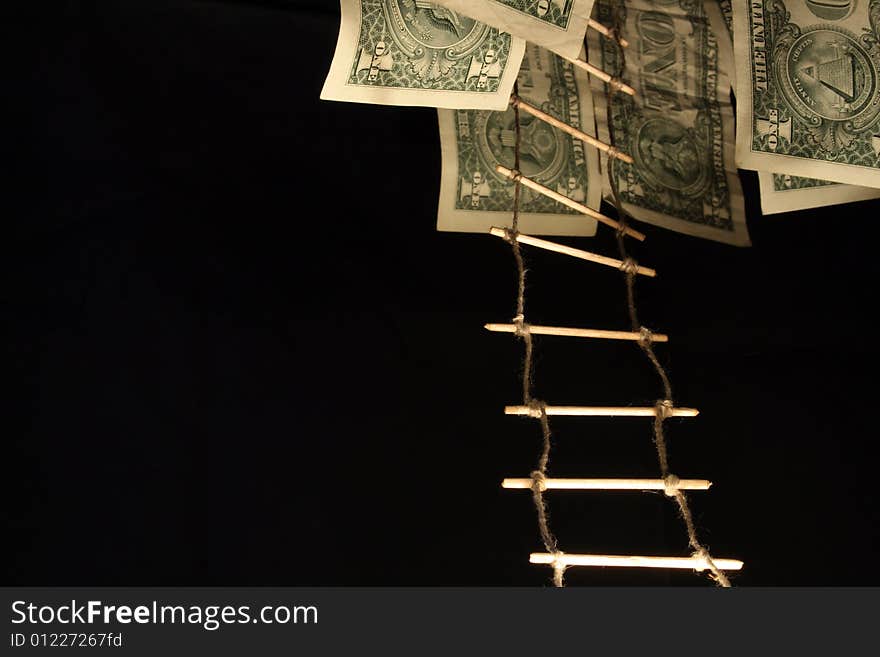 One dollar banknotes and rope-ladder hanging on dark background. One dollar banknotes and rope-ladder hanging on dark background