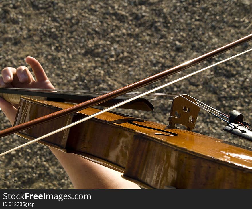 Macro of a viola, the strings, corpus and the bow