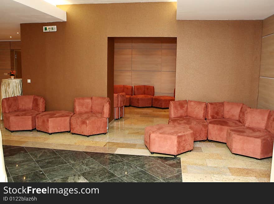 Many many armchairs in the room