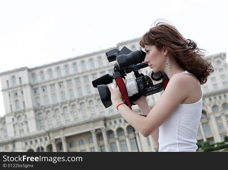 A young and nice reporter girl